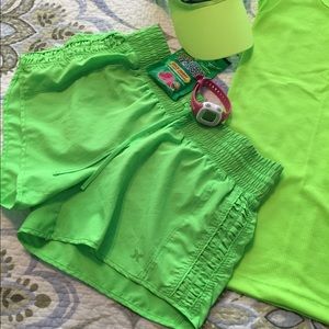 Xersion lime green ruffle side shorts