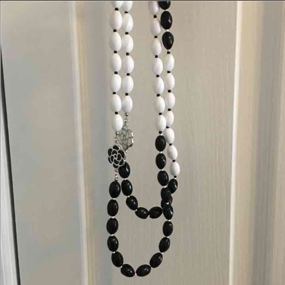 White and black bead necklace with roses