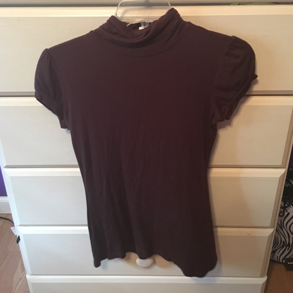 Brown shirt.