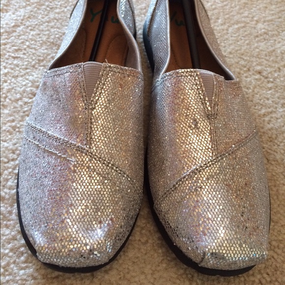New, size 7, silver glitter slip-on shoes