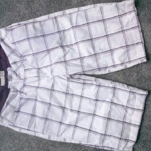 Vans purple and white plaid shorts