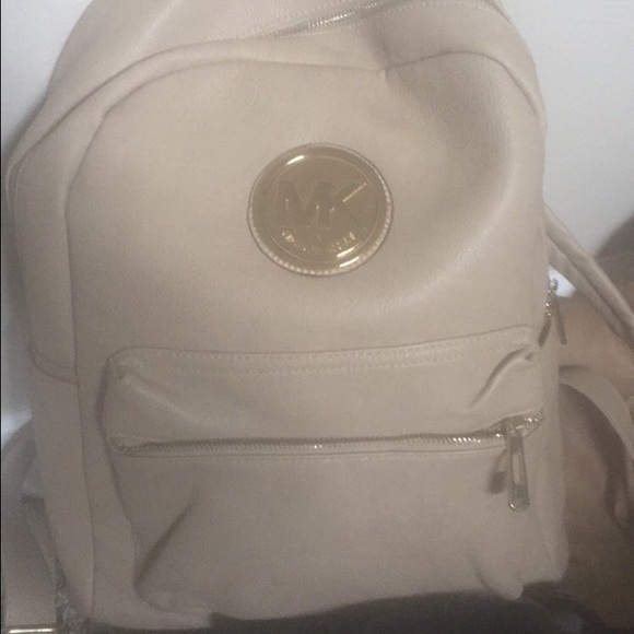 Full sized authentic Michael kors book bag.