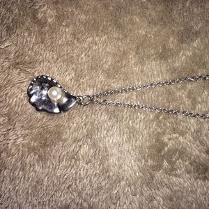 Oyster with pearl necklace