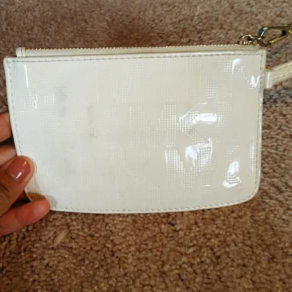 *Holding* MK wallet/coin purse