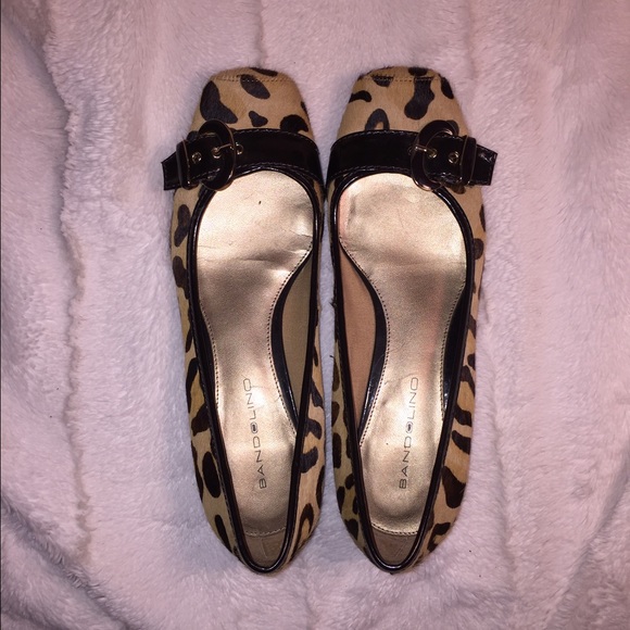 Cheetah print flats with brown buckle