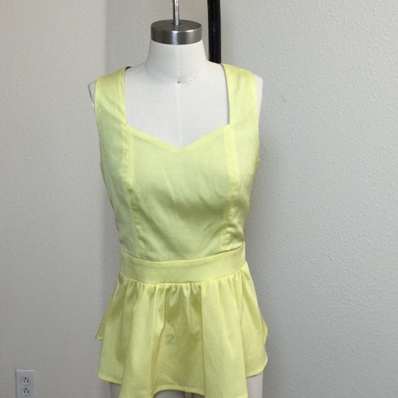 New. heart shape cut out back sleepless top