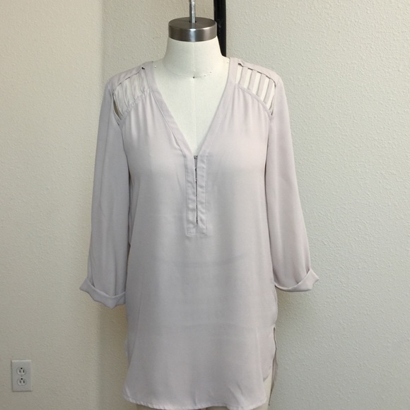 New 3/4 sleeves tunic top with cut out details