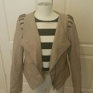 Edgey tan motto jacket