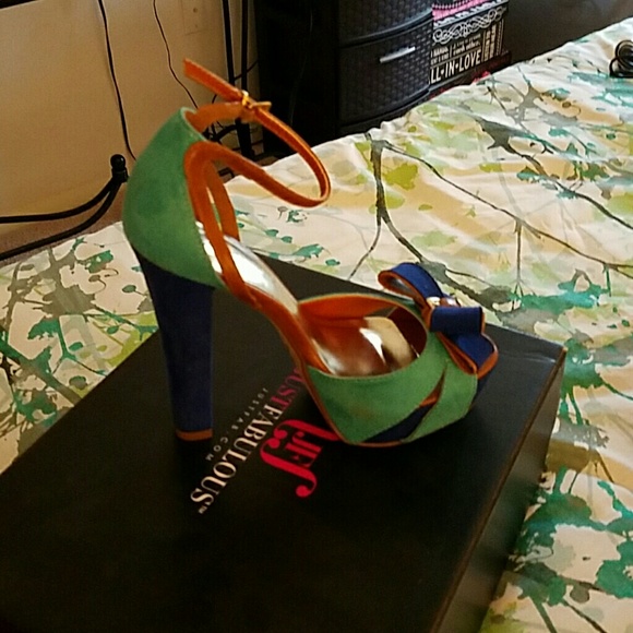 A pair of turquoise  sandals