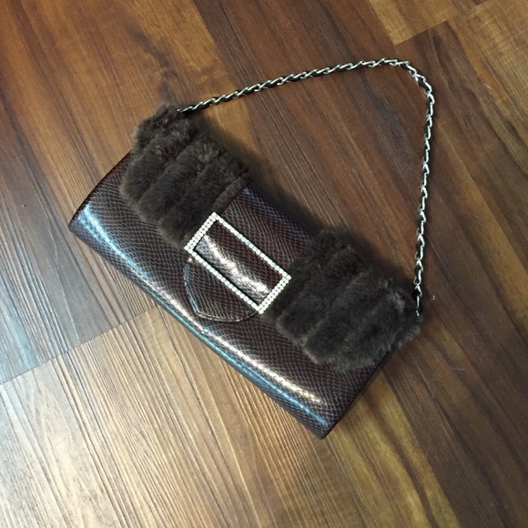 Brown fur clutch with rhinestone buckle