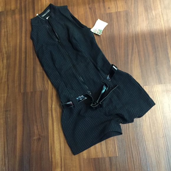 Black Guess belted jumpsuit.