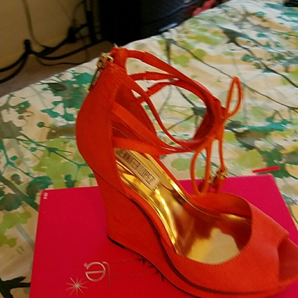 A pair of high heel wedges