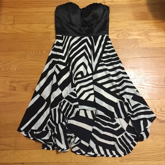 Super cute hi-low dress with staple back cutouts