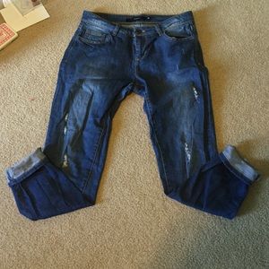 Jeans with little rips in them