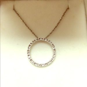 White gold and diamond circle pendant