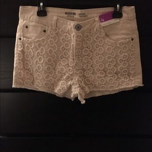 Cream color high waisted shorts