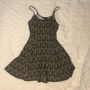 black patterned skater dress