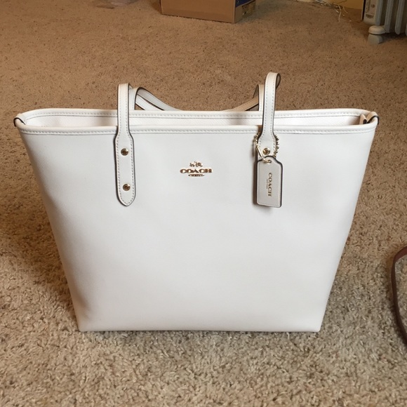 Never been used white COACH handbag