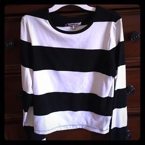 Jennifer Lopez black and white striped tee