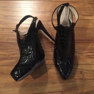 Beautiful black patent leather heeled booties