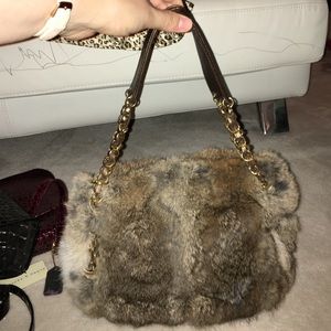 Paradox furry bag with gold chains