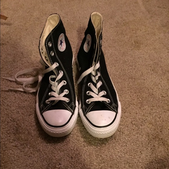 Black Hightop Converses.