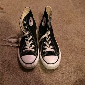 Black Hightop Converses.