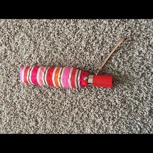 Coach umbrella with leather strap