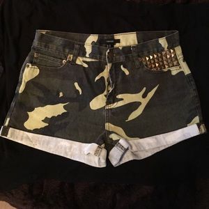 Slightly high waisted camo/studded shorts!