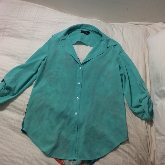Turquoise blouse with floral open back
