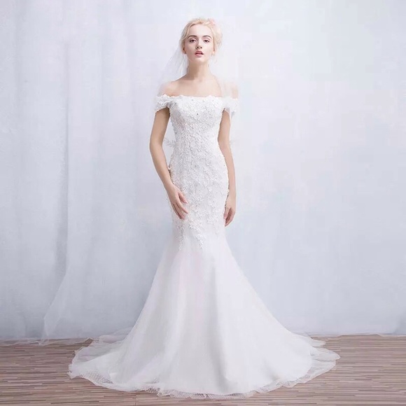 Off shoulder wedding gown
