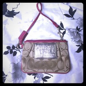 Small coach poppy wristlet used