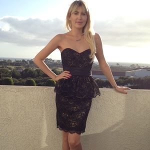 Black and gold lace peplum dress