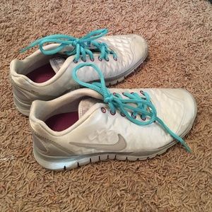 Nike free runs, silver & purple.