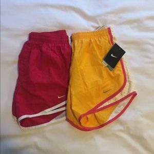 2 pairs of Nike tempo running shorts.