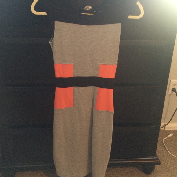 Manhattan jersey dress with orange color block.