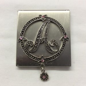 “A" double sided Mirror compact