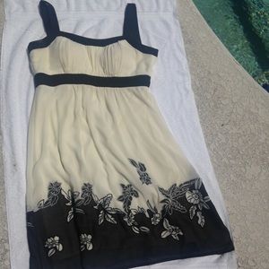 A black and white/cream colored dress🎀