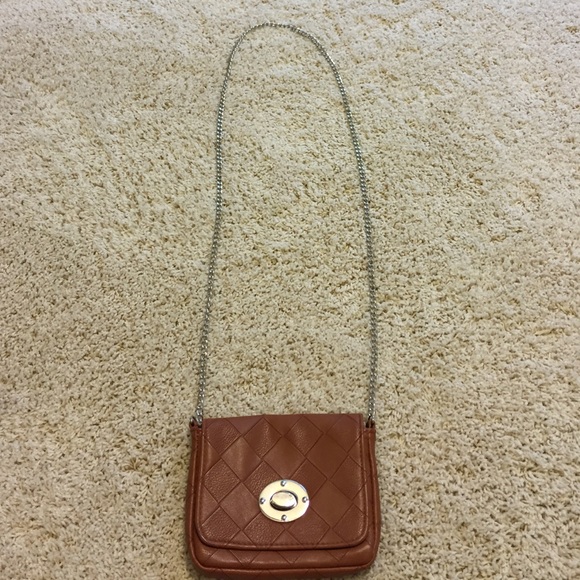 Tan, mini bag. Only used a couple of times.