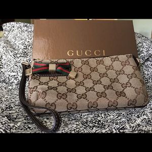 Gucci wristlet 📌SOLD 📌