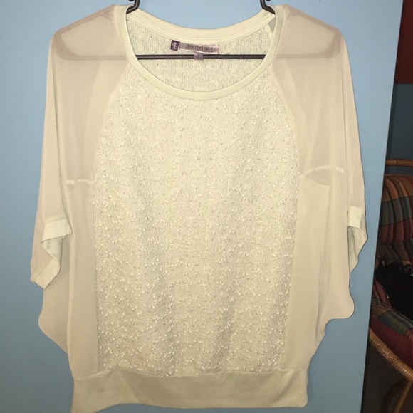 Jennifer Lopez sea foam blue/green blouse.