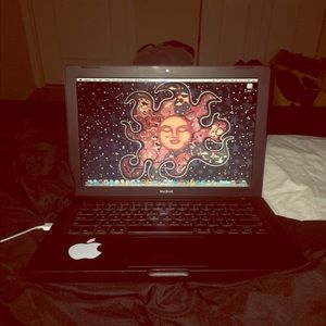 Black MacBook snow leopard.