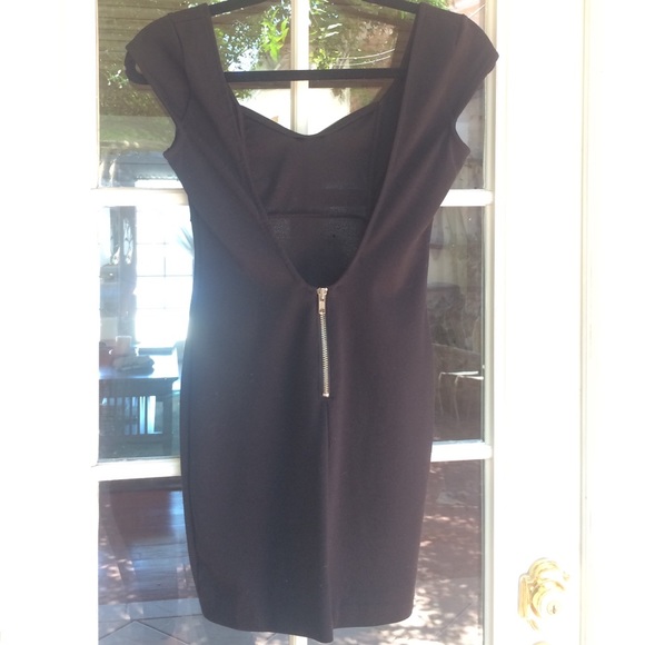 Black sexy minidress with low back,  zipper detail