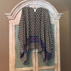 Is it a jacket or a wrap or a shawl?