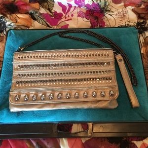 Soft leather Crossbody/wristlet bag.