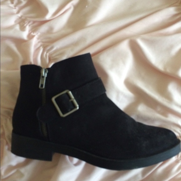 Black booties with a buckle. Rarely worn.