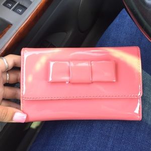Coral bow wallet and pink converse