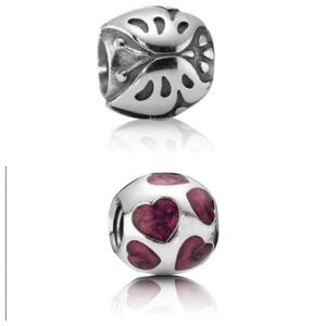 2 Authentic discontinued Pandora charms
