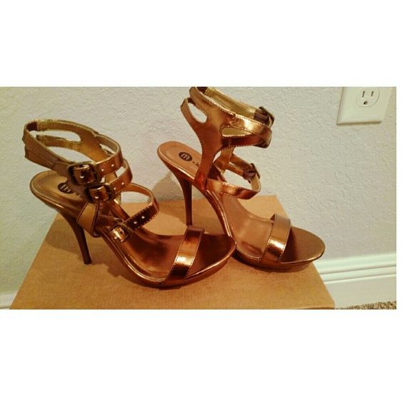 Michael Antonio Gold Heels