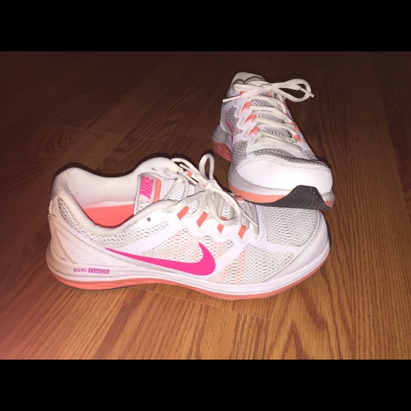 Womens size 9 Nike white, pink, and orange.